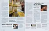 Oppslag i magasin med foto av person som gjennomgår gule arkivpermer i et arkivrom.